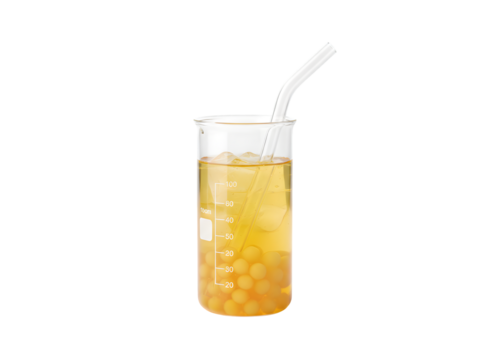 A glass beaker filled with yellow bubble tea and yellow tapioca pearls, set against a white background.