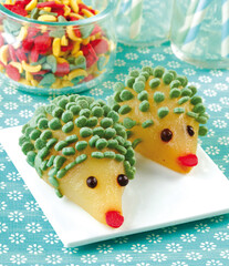 Natural fruit dessert in the shape of a little mouse for children
