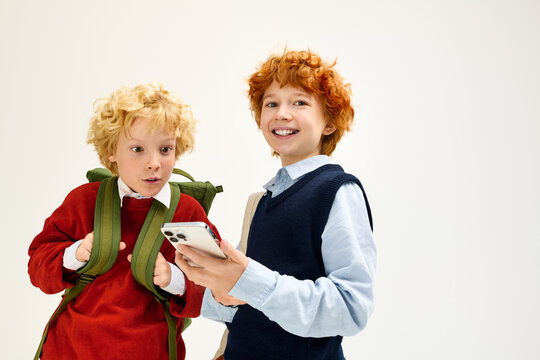 Stylish children exploring technology in a bright and cheerful setting