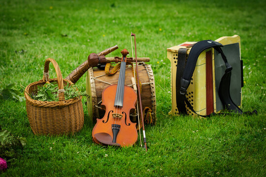 Musical instruments placed on the grass during a an annual Latvian festival celebrating the summer solstice