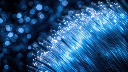 Fiber bundle macro photography showing individual glass fibers with bright blue light paths streaming through transparent optical strands