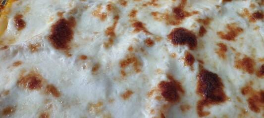 Fondo de una lasa&ntilde;a dorada horneada