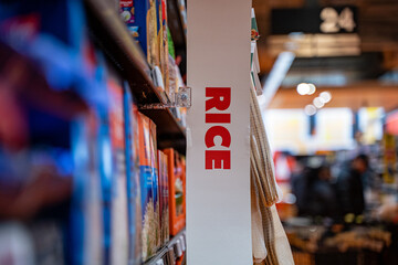 View of rice aisle sign in supermarket.