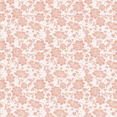 Seamless pattern of peach colored roses and leaves on a white background with a lace like texture