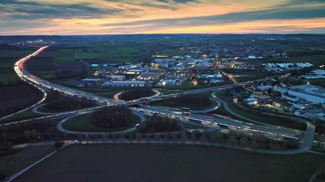 aerial view of Highway intersection Stuttgart North connecting German Highways A81 and B10 during rushour at dawn, Baden W&uuml;rttemberg, Germany 