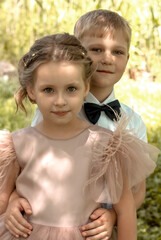 Sweet Siblings Dressed Up for a Special Occasion
