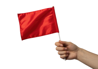Hand holding a small waving red flag on a stick isolated on transparent white background 