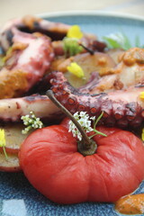 Grilled octopus with golden potatoes and creamy rocoto sauce—a bold and flavorful seafood dish showcasing the richness of Peruvian cuisine.