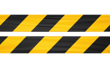 Strips of wrinkled yellow and black striped caution tape for restricted areas isolated on transparent white background 