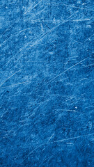 scratched blue metal sheet with visible texture. background