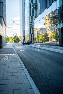 Corporate street architecture forming an empty modern urban cityscape in the financial district, with business tone and future cues enhancing structural clarity
