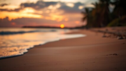 Serene beach sunset with golden tones and a softly focused horizon, creating a peaceful atmosphere.