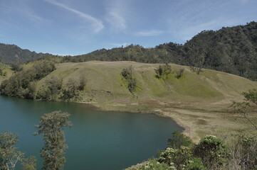 Ranu Kumbolo beautiful lake below mount Semeru, highest mountain in Java, Indonesia