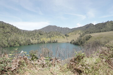 Ranu Kumbolo beautiful lake below mount Semeru, highest mountain in Java, Indonesia
