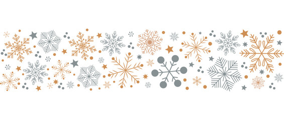 A seamless horizontal pattern and border composed of various stylized snowflakes, stars, and dots in grey-blue and warm gold tones on a white background.