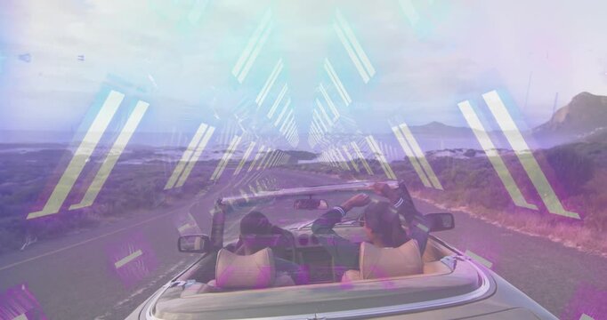 Passenger turning and raising arm causing driver raising arms cheering coast auto neon tracing arms