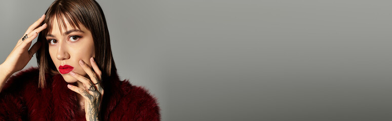 Young woman showcases striking fashion and beauty in a modern setting