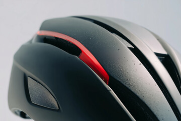 Close-up view of a matte aerodynamic helmet showcasing advanced design for athlete protection during high-speed sports activities