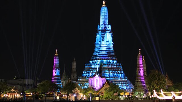 Chao Phraya River Sunset Video Background, see the colorful lights from the spotlights at the 2025 Chao Phraya River Festival, see the beautiful Wat Arun, a world-class tourist attraction.