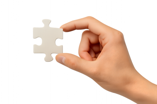 A hand holding puzzle piece for the concept of problem solving and decision making.