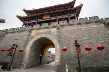 Ancient chinese city gate with red lantern decoration