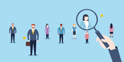 Magnifying glass focuses on woman in crowd of business people