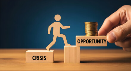 Wooden figure steps from crisis to opportunity with stacked coins symbolizing financial recovery and growth guided by a hand towards success and investment on a wooden surface