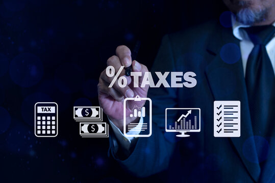 Businessman touching taxes percentage. Government, state taxes. Data analysis, paperwork, financial research, income tax and property, Tax Payment. TAX online payment and technology concept.