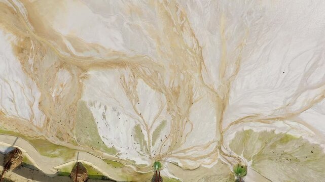 Aerial drone view of tailings pond near a cement factory near to Devnya, Varna, Bulgaria. Industrial scene of environmental impact