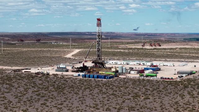 Vaca Muerta, Argentina, October 27, 2025: Aerial view of a drilling rig for unconventional oil and gas extraction (shale oil) in A&ntilde;elo, Neuqu&eacute;n. Drilling equipment in the shale capital.