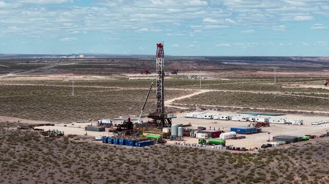 Vaca Muerta, Argentina, October 27, 2025: Aerial view of a drilling rig for unconventional oil and gas extraction (shale oil) in A&ntilde;elo, Neuqu&eacute;n. Drilling equipment in the shale capital.