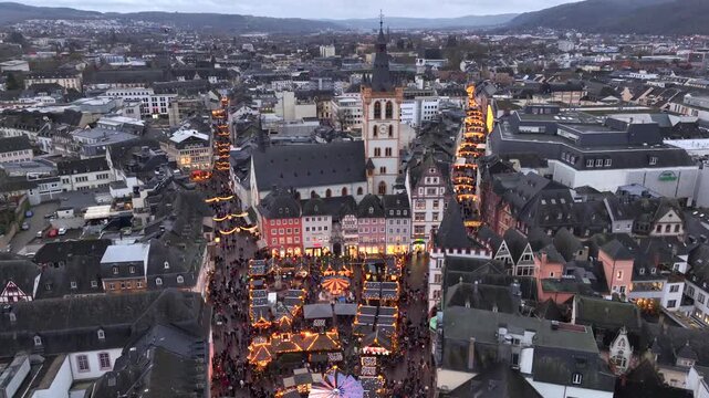 New Year in Trier, Germany. Trierer Weihnachtsmarkt, Aerial view of Hauptmarkt, Cathedral of Trier and Christmas market.