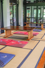 Traditional Japanese restaurant in house home or ryokan restaurant with sliding paper shoji doors and natural garden,restaurant interior.