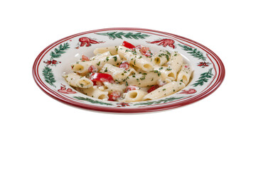 plate of creamy pasta with vegetables, cooked pasta dish isolated on white