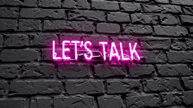 Pink neon let's talk sign glowing on dark black brick wall, communication concept and conversation invitation background