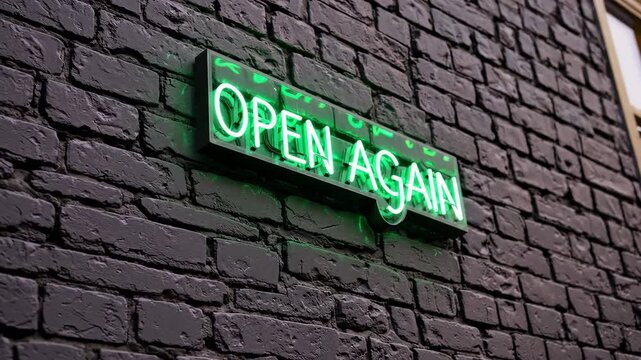 Bright green neon open again sign mounted on dark textured brick wall, business reopening announcement and welcoming entrance concept for shop or restaurant