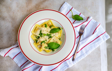 Ravioli with parmesan and basil .Cacio e pepe pasta