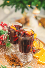 Mulled wine on Christmas background. Selective focus.