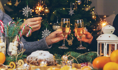 Champagne on the Christmas table. Selective focus.