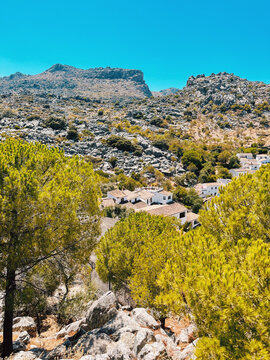 Typical Spanish white village between mountains under a clear blue sky. Montejaque, Granada, Andalusia, Spain.