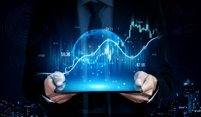 A businessman analyzes dynamic financial data on a digital tablet, showcasing graphs and a world map against a vibrant urban skyline at night. Scalp