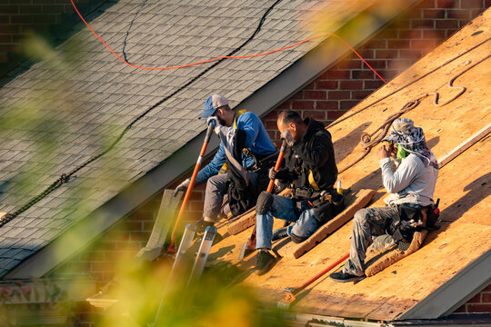 Multifamily dwelling roof replacement with a shallow depth of field