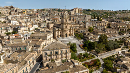 Aerial view of the façade of the Cathedral of San Giorgio, located in Modica, in the province of Ragusa, Sicily, Italy. It is a symbolic monument of Sicilian Baroque and the town's main attraction.