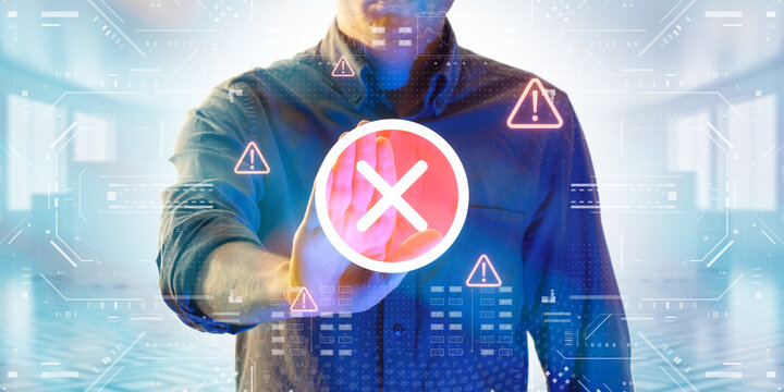 Man presses a glowing digital cancel icon surrounded by warning symbols. Concept of cyber attack, malware, data breach, system hack ing, virus, spyware, compromised information and urgent attention.