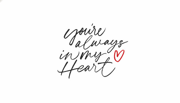 Elegant handwritten typography expressing eternal affection and love with the heartfelt message 'You're Always in My Heart', featuring a charming red heart icon