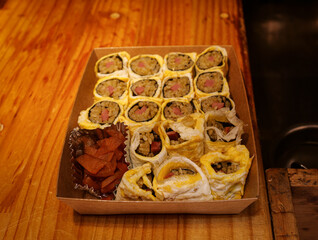 Korean Egg Roll Gimbap Served in Takeout Box