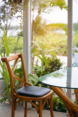 Serene garden cafe with wooden furniture in hoi an, vietnam