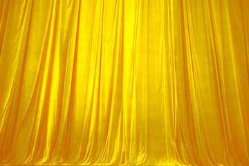 Vibrant Gold or Yellow Stage Curtain Texture Background