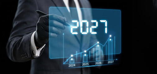 2027 year Business Growth Chart – Business man -Digital Blue Hologram Presentation on Black Background