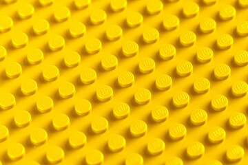 Naklejka premium Lviv, Ukraine - November 16, 2025: LEGO Brick Surface Texture Background